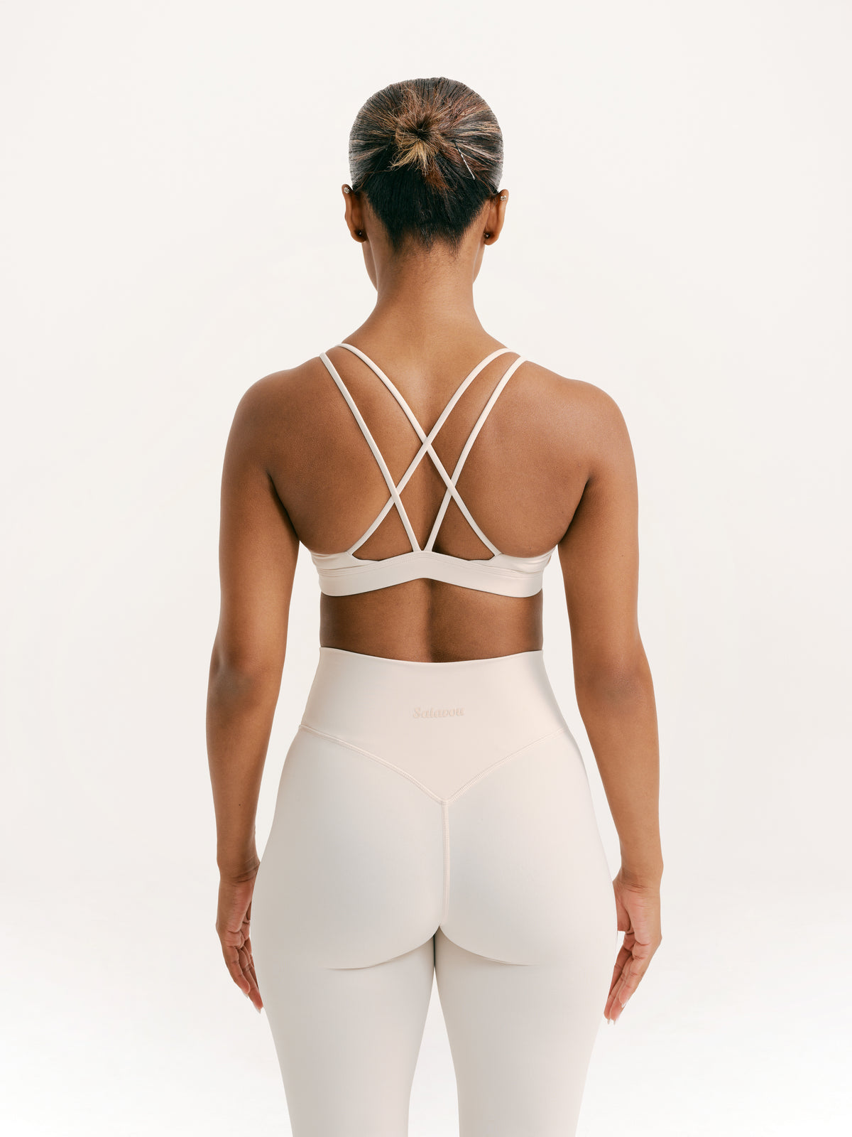 Salavou Interlace cross back sports bra in Beige